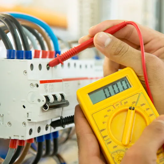 Affordable electrician in Pretoria inspecting a residential electrical panel.
