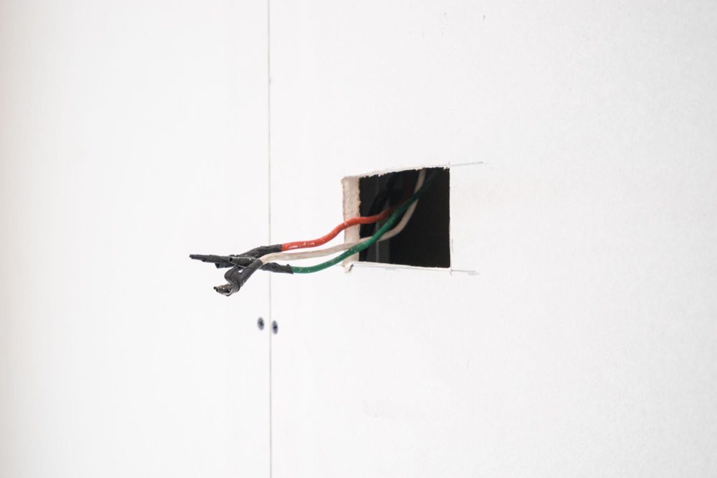 Comparison between professional licensed electrician and unsafe electrical work